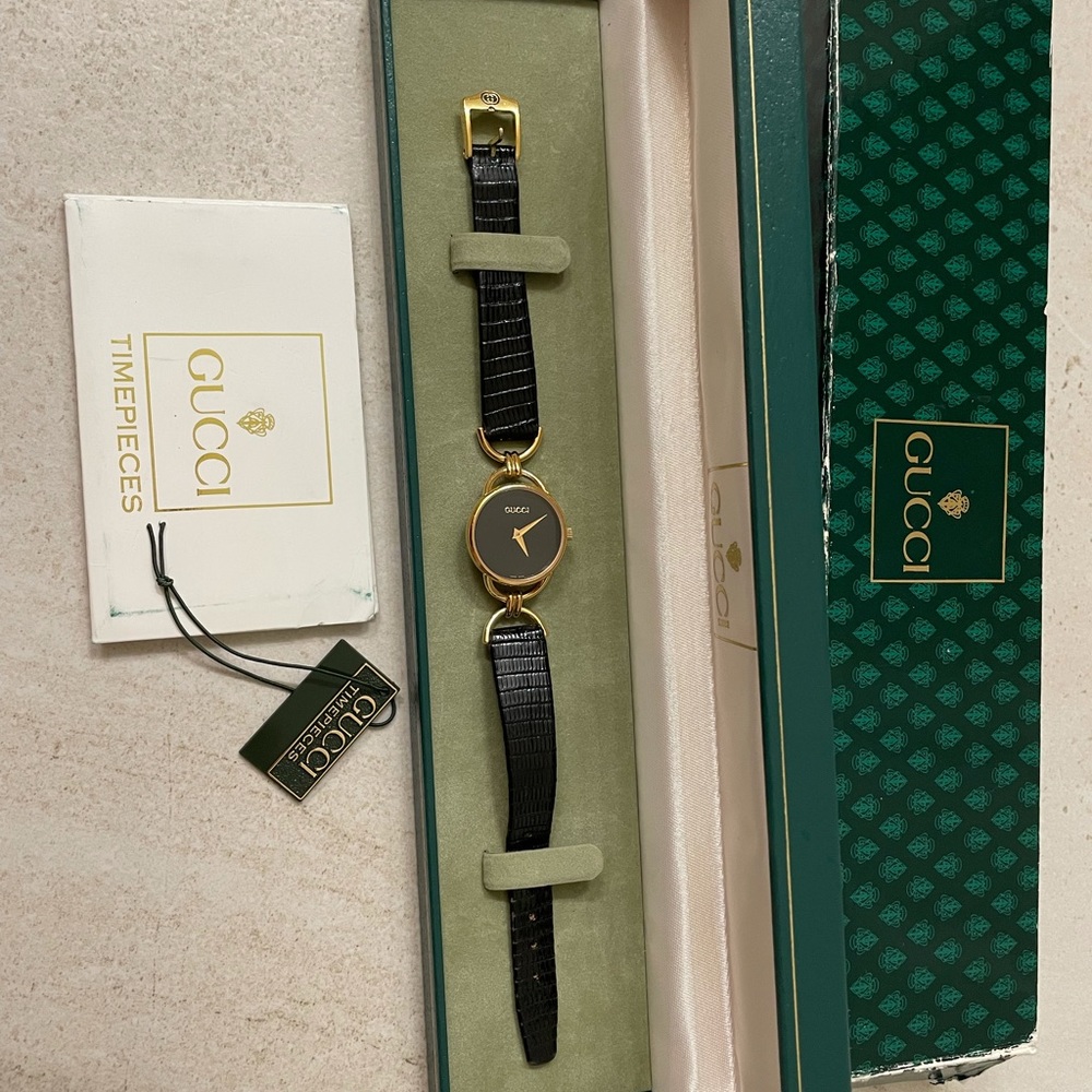 Vintage Gucci Watch. still in box. great condition.